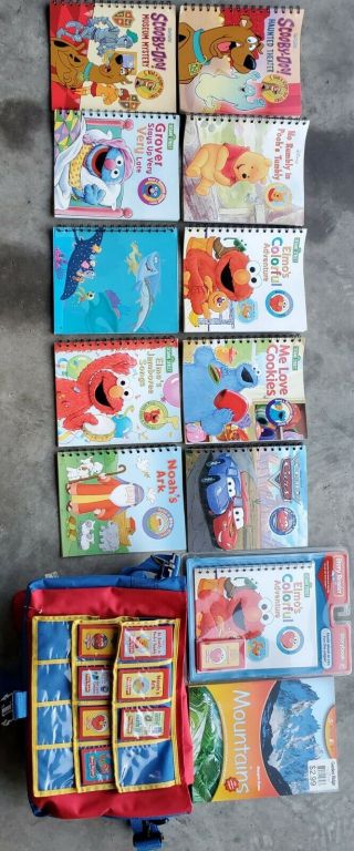 7 Story Reader Cartridges Nemo,  Elmo,  Cars,  Winnie.  Reader Device Not.
