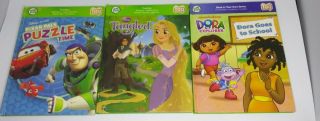 Leapfrog Tag Pen Book — Dora The Explorer,  Tangled,  Pixar Pals Puzzle Time