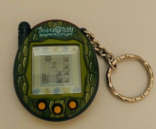 2004 Bandai Tamagotchi Connection Virtual Pet Keychain Green Snake Scales Rare