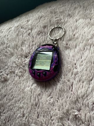 Working: Tamagotchi Connection V6 Music Star English Purple Flames 2008 (us)