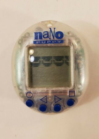 1997 Nano Puppy Clear Virtual Pet By Playmates W/ Batteries And Instructions