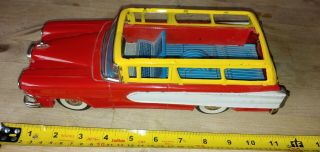 Vintage T.  N Nomura Tin Toy Edsel Friction Car Approximately 11 Inches Long 4.  25w