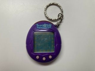 Tamagotchi Connection Version 2 (2004) - Purple W/  Battery Tested/works
