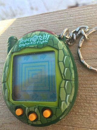 tamagotchi connection,  version 3,  green snake reptile,  no battery 2