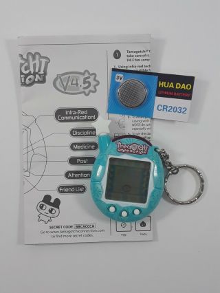 2004 Bandai Tamagotchi Connection V4.  5 Blue Hibiscus With Battery & Instructions