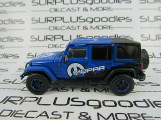 Greenlight 1:64 Loose Black & Blue Mopar 2012 Jeep Wrangler Unlimited 4 - Door