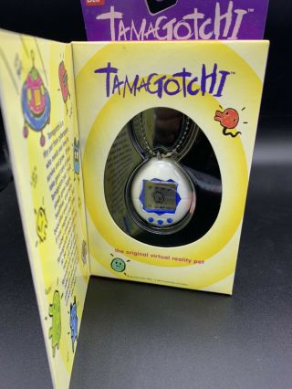Tamagotchi Bandai White 1996 - 1997 English Description Virtual Reality Pet Retro