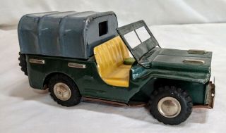 Vintage Friction Tin Toy Army Jeep Made In Japan.  7.  5 "
