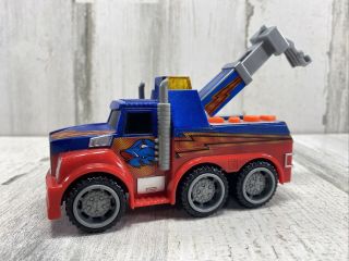 Toy State Road Rippers 5 In.  Tow Truck - Lights,  Sounds,  Forward,  & Reverse.