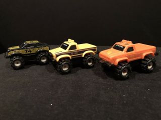 Vintage Schaper Stomper Orange Ford 4x4 Truck,  Yellow Chevy S10,  Black Amc Eagle