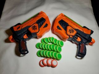 Two Nerf Zombie Strike Fusefire Vortex Disc Blasters Lights Up & 26 Disc Ammo