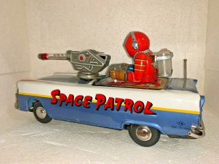 VINTAGE NOMURA SPACE PATROL CAR w ASTRONAUT COLORFUL BATTERY OPERATED TIN TOY 2