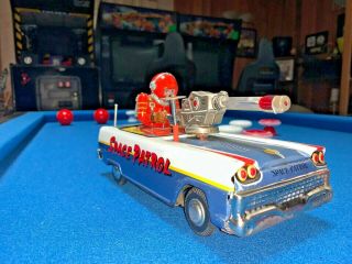 VINTAGE NOMURA SPACE PATROL CAR w ASTRONAUT COLORFUL BATTERY OPERATED TIN TOY 4