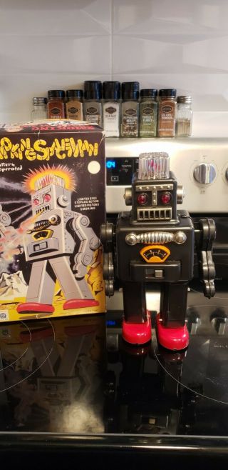 Smoking Spaceman Robot Battery Operated Tin Toy.  Dark Grey.