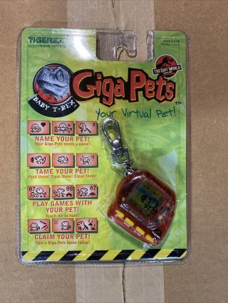 Tiger Electronics Giga Pets Jurassic Park Baby T - Rex Lcd Key Chain Game - A2