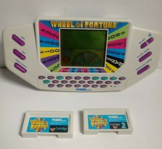 1995 Tiger Wheel Of Fortune Hand Held Game & 2 Carts,  And