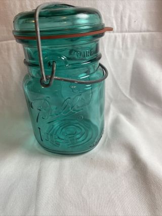 Vintage pint ball mason jar.  Blue glass With Glass Lid And Wire 1976 3