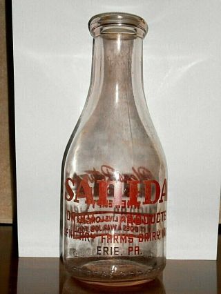 Vintage Sanida,  Erie,  Pa.  Round,  Clear Glass,  Quart Milk Bottle - Usa