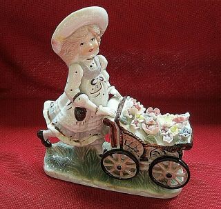 Vintage Porcelain Young Girl Pushing Flower Cart Figurine,