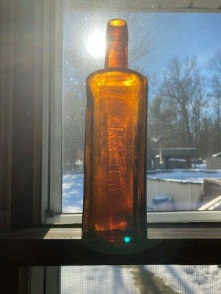 R.  S.  Co Tall Square Amber Medicine Bottle