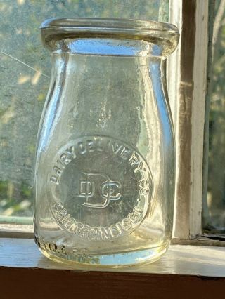 Dairy Delivery Co. ,  San Francisco.  Colorless Cream Bottle.