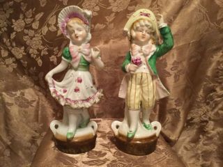 Vintage Porcelain Boy/girl Figurines Copyright L & M Inc.