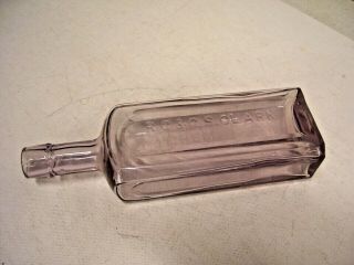 Antique Embossed - R.  C.  & C.  S.  Clark Chemists Bottle,  Violet Tinted Corktop