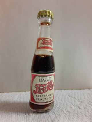 Vintage 1940s Pepsi Cola Mini Full Bottle W Metal Cap Paper Label Made In.
