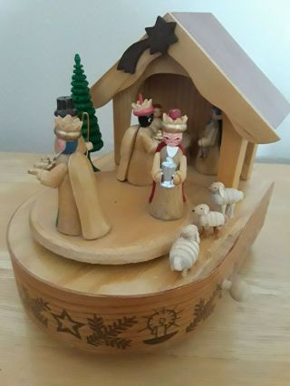 Wooden Christmas Music Box.  Plays Silent Night While Figures Rotate.