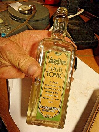 YYY - vintage 1/2 full glass bottle - Vaseline hair Tonic 6 oz.  - metal lid - 2