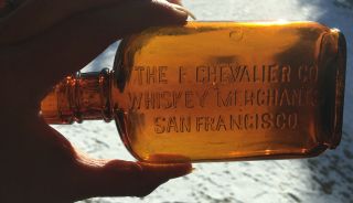 Early San Francisco,  Ca.  The Chevalier Co.  Embossed Amber Half Pint Liquor Flask