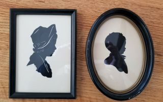 Two Vintage Silhouette Pictures.  Lady In Rectangle Frame And Child In Oval Frame