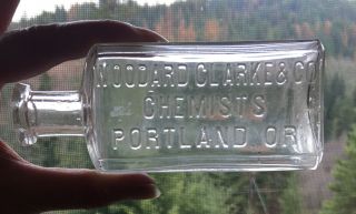 Early Portland,  Ore.  Woodard Clarke And Co.  Embossed Pharmacy Drug Bottle