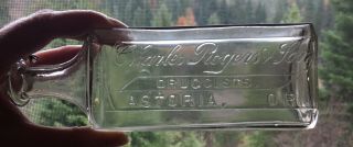 Early Astoria,  Ore.  Charles Rogers And Son Embossed Pharmacy Drug Bottle