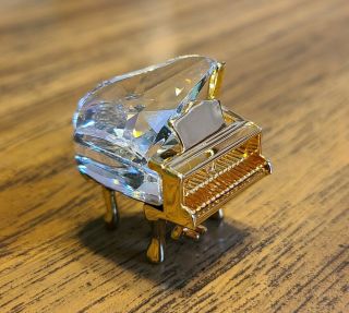 Swarovski Crystal Memories Miniature Gold Plated Baby Grand Piano Figurine,  Logo