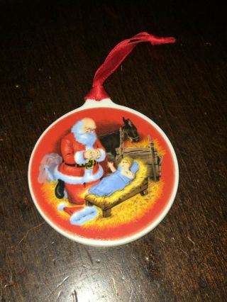 1984 Roman Inc The Kneeling Santa Baby Jesus Christmas Ornament Porcelain Rare