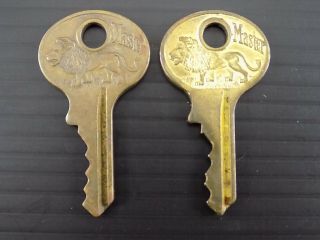 2 Vintage Solid Brass Master Lock Standing Lion Keys 2396