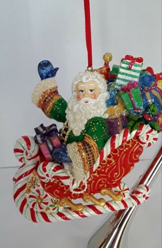 Radko Candy Cane Ride Santa 5.  25 " Resin Sleigh Ornament Arm Waves When Touched