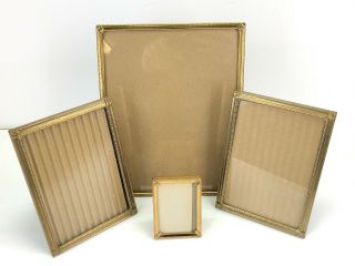 4 Vintage Gold Tone Metal Frames 8x10,  (2) 5x7,  2.  5x3.  5 Easel Back Table Top