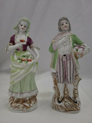 Vintage Porcelain Colonial Man And Woman Figurines