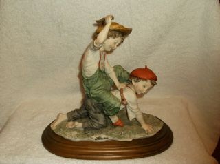 Giuseppe Armani Capodimonte Figurine - Two Boys Playing Horseback Ride