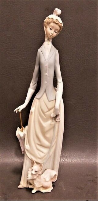 Lladro Woman With Umbrella And Dog Figurine 4761
