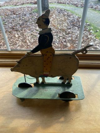 Vintage German? French Metal Toy Clown On A Pig Pull Toy