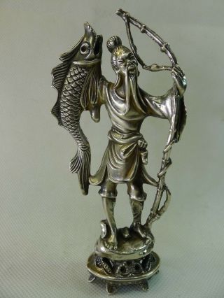 Very Highly Detailed Silver Figure Of A Fisherman With His Large Catch.