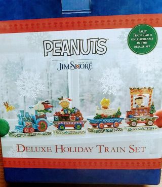 Jim Shore Peanuts Deluxe Holiday Train Set.  Before Bidding