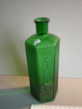 Green 12 Oz.  Hexagonal Poison Bottle.  " Not To Be Taken "