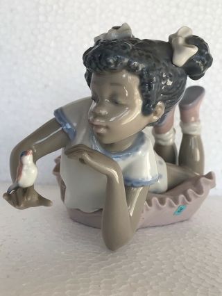 Lladro Figurines Girl Laying On A Pillow Looking At The Bird On Her Hand