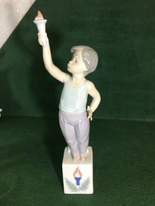 Lladro Special Olympics Boy With Torch Figurine 5870 7513