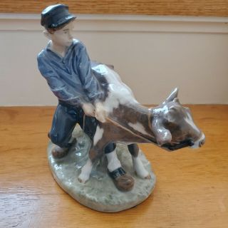 Royal Copenhagen Figurine Boy With Calf Cow 772