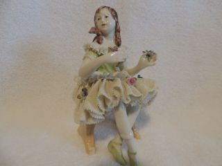 Dressian Lace Young Lady Figurine Sitting On A Bench.